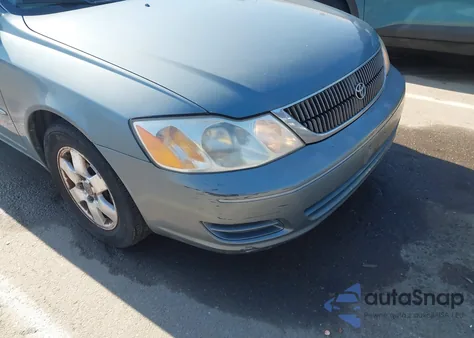 2001 Toyota Avalon Xl z USA, uszkodzony, nr VIN 4T1BF28B91U154124